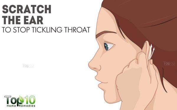 scratch the ear to ease tickling throat